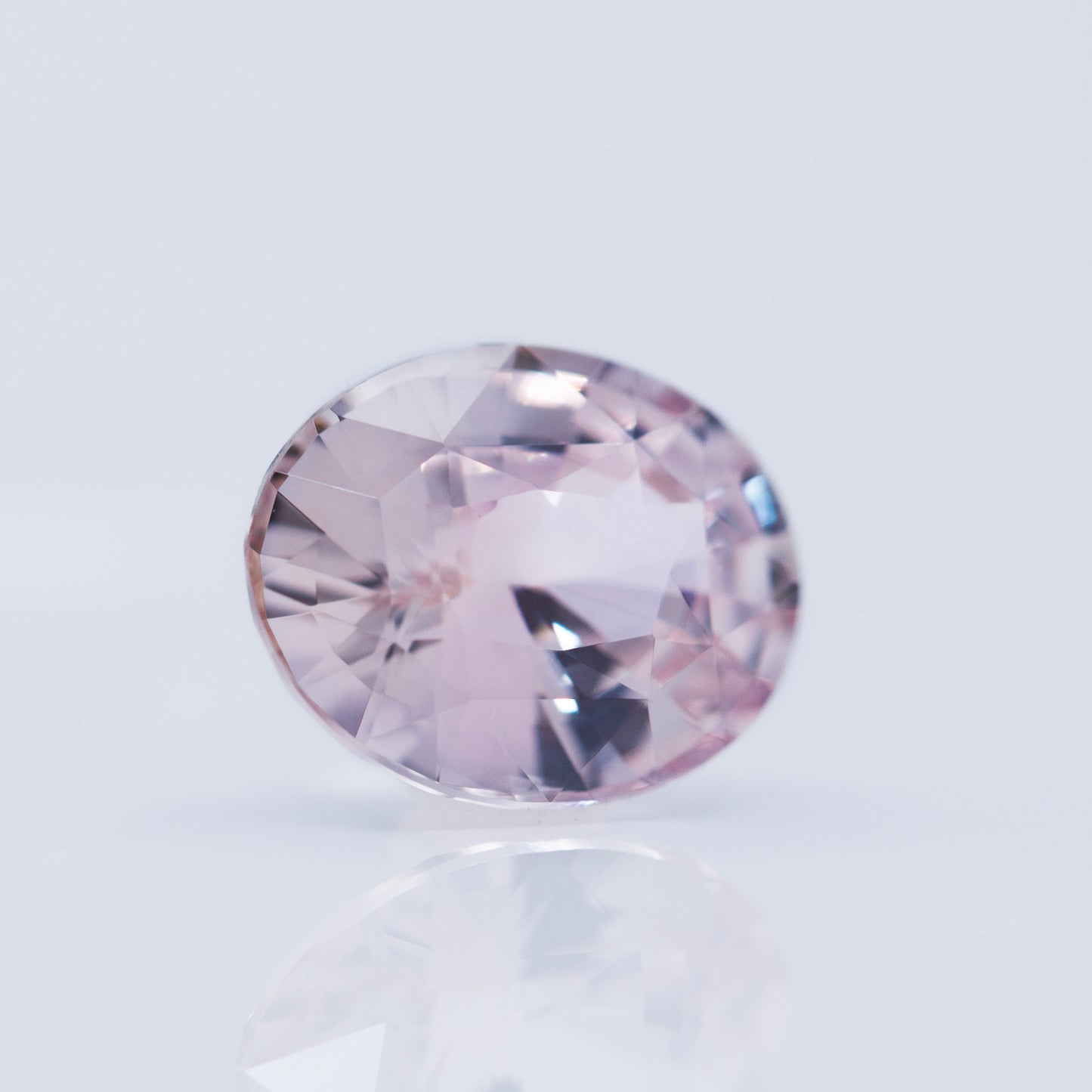 peach pink oval cut sapphire
