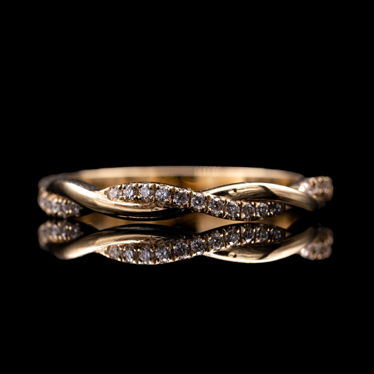 twisted band wedding band with diamond