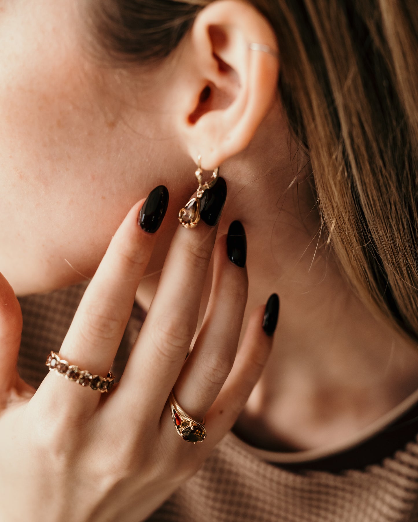 lifestyle of fall collections gold earings with andalusite and rings