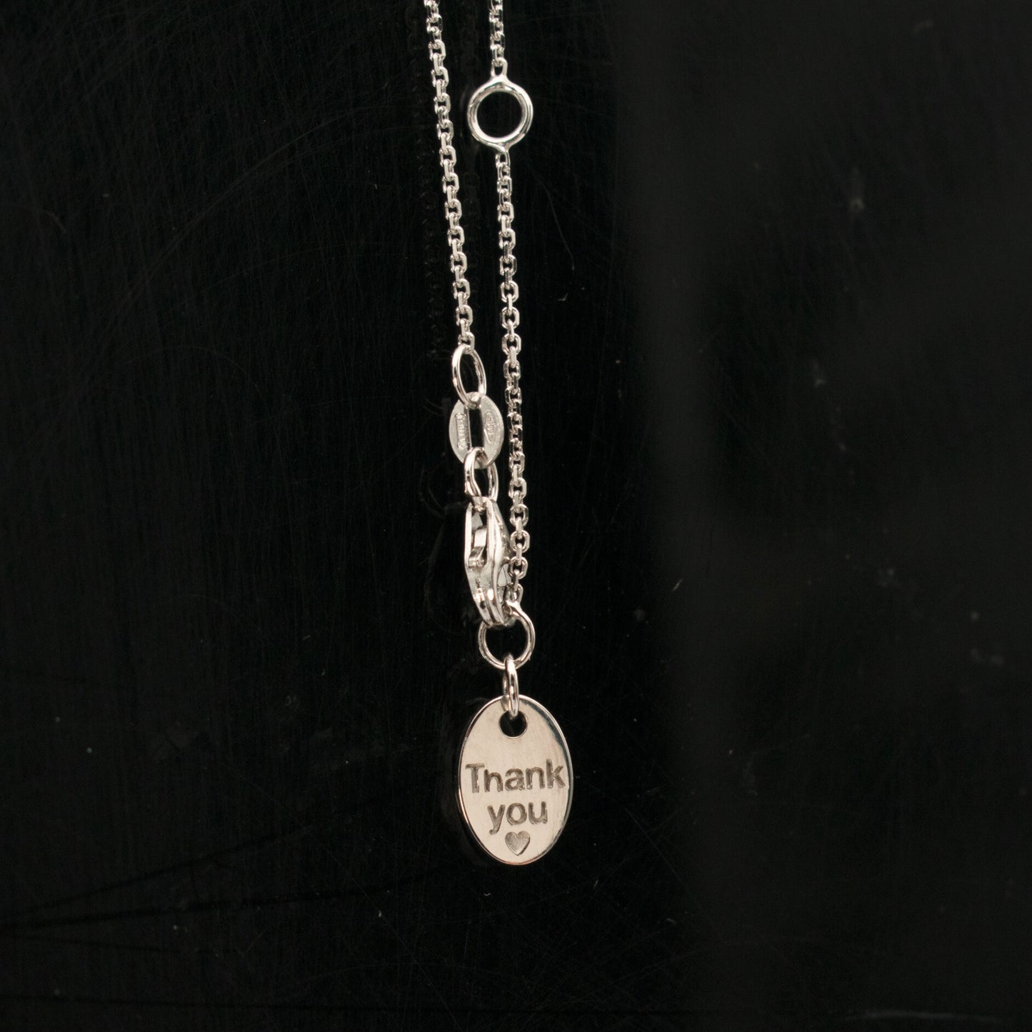 adjustable chain with floral pendant medallion with white sapphire and diamonds detailing