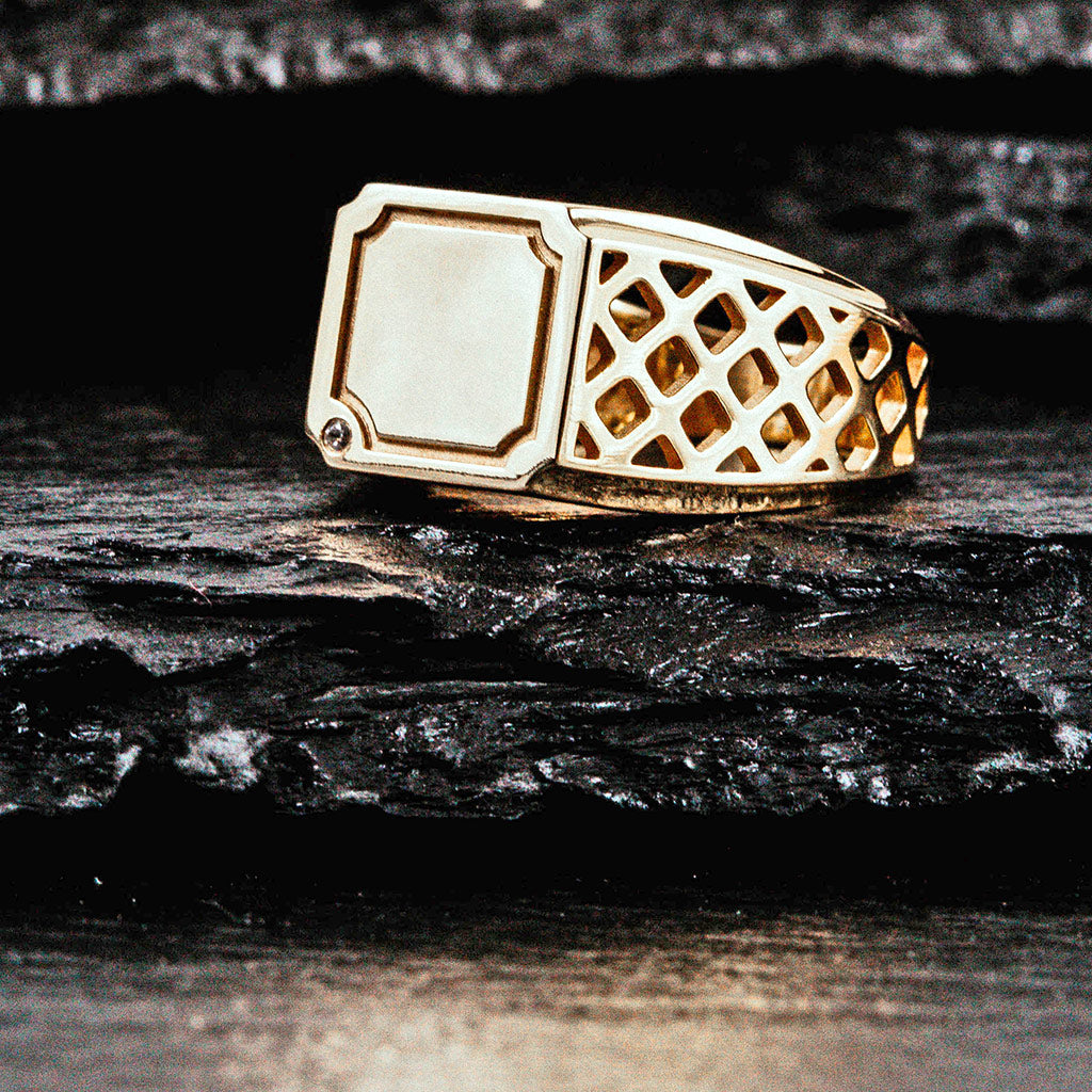 A square gold signet ring