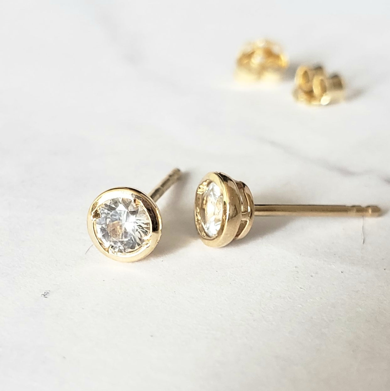 white sapphire studs