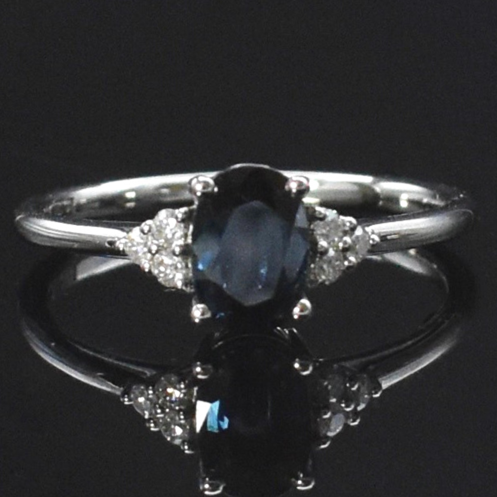oval sapphire engagement ring with side stones