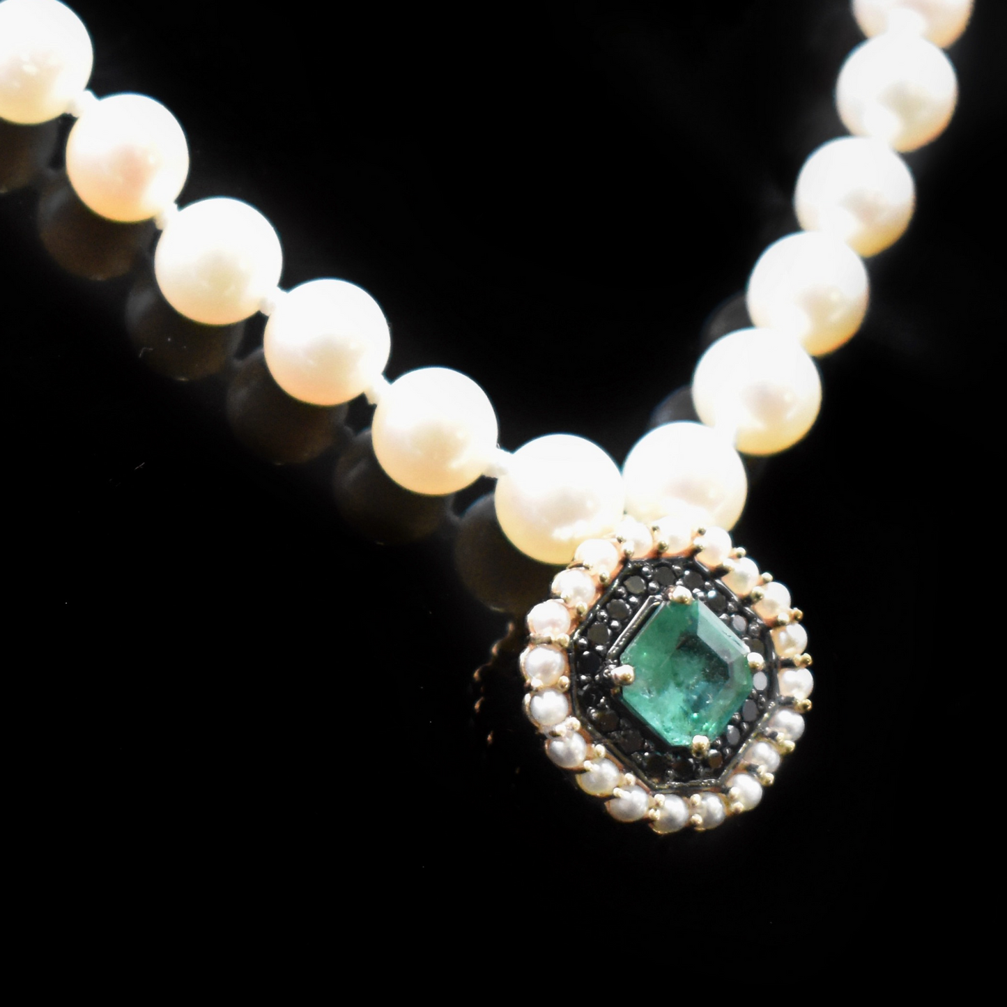 fresh water pearl necklace with emerald charm