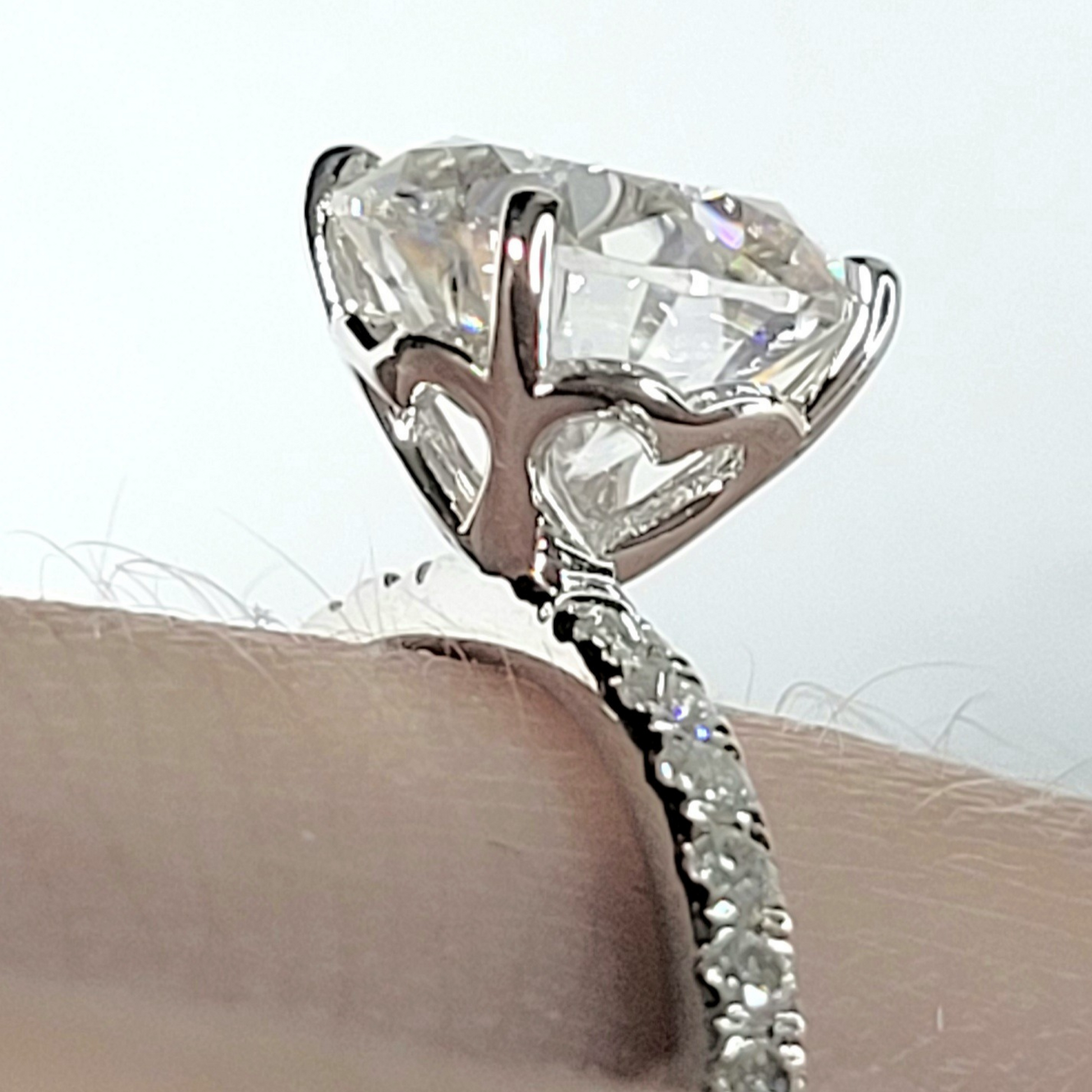 heart shaped hidden halo on diamond solitaire ring