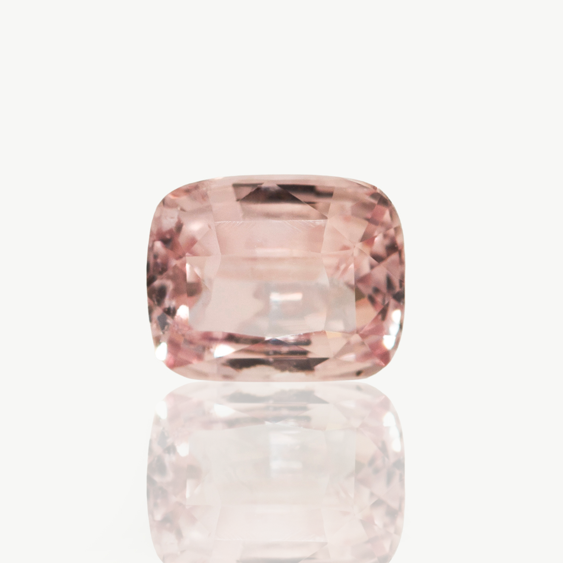 1.04ct peachy pink padparadscha sapphire, cushion cut gemstone