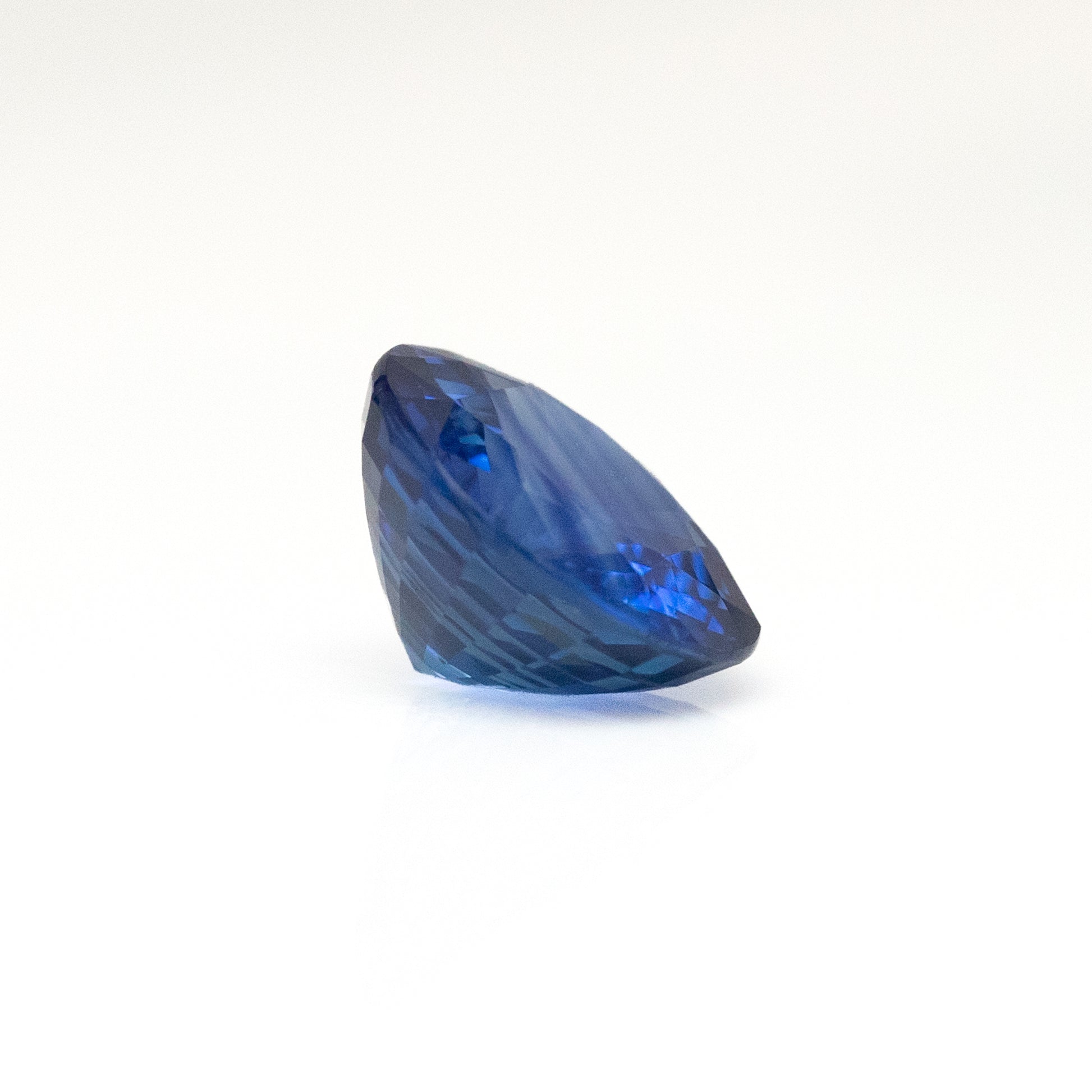 side profile natural blue sapphire 3 carat stone round cut