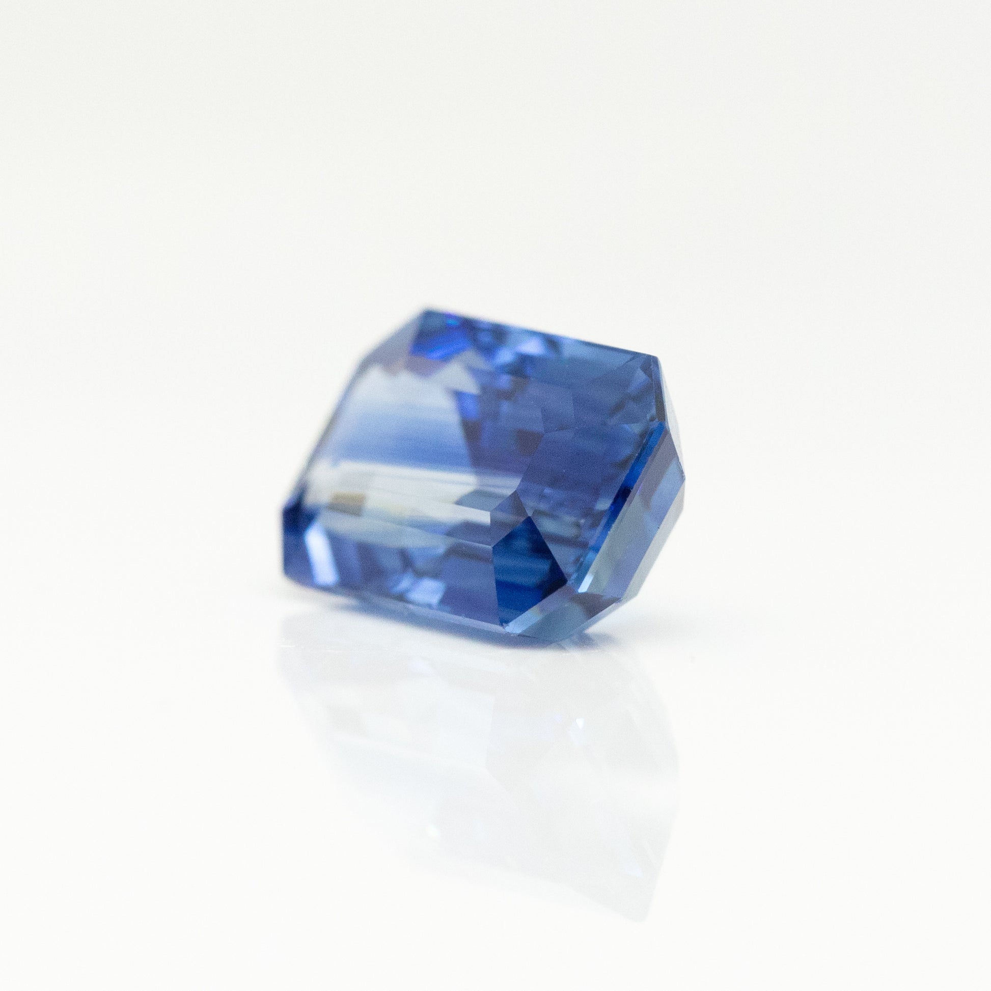 side profile emerald cut natural blue sapphire 3 carat stone 