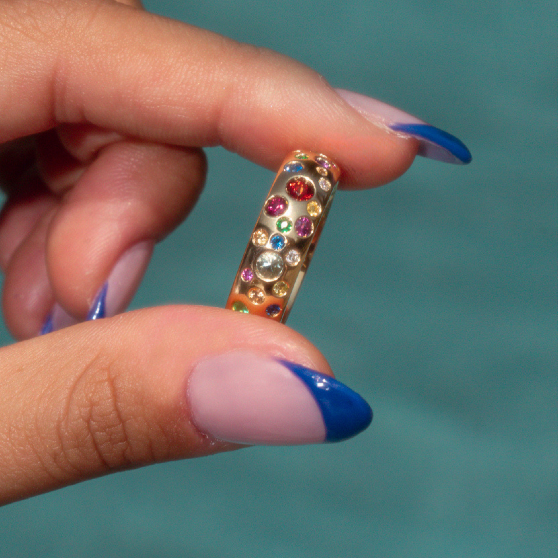 dome 14k gold ring with rainbow gemstones 