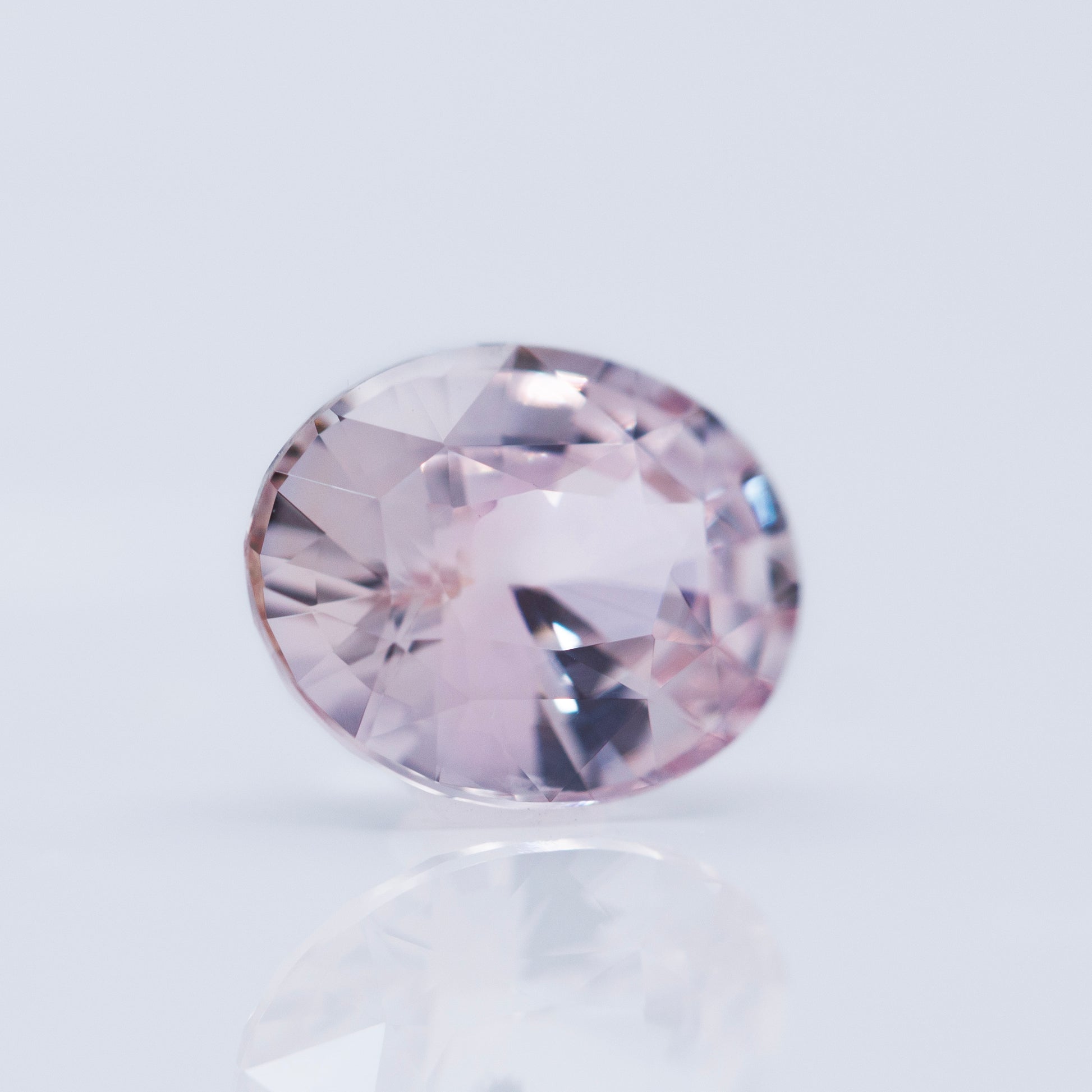 peach pink oval cut sapphire