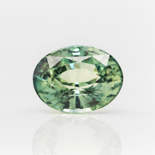 Vivid green oval sapphire, loose gemstone for engagement ring