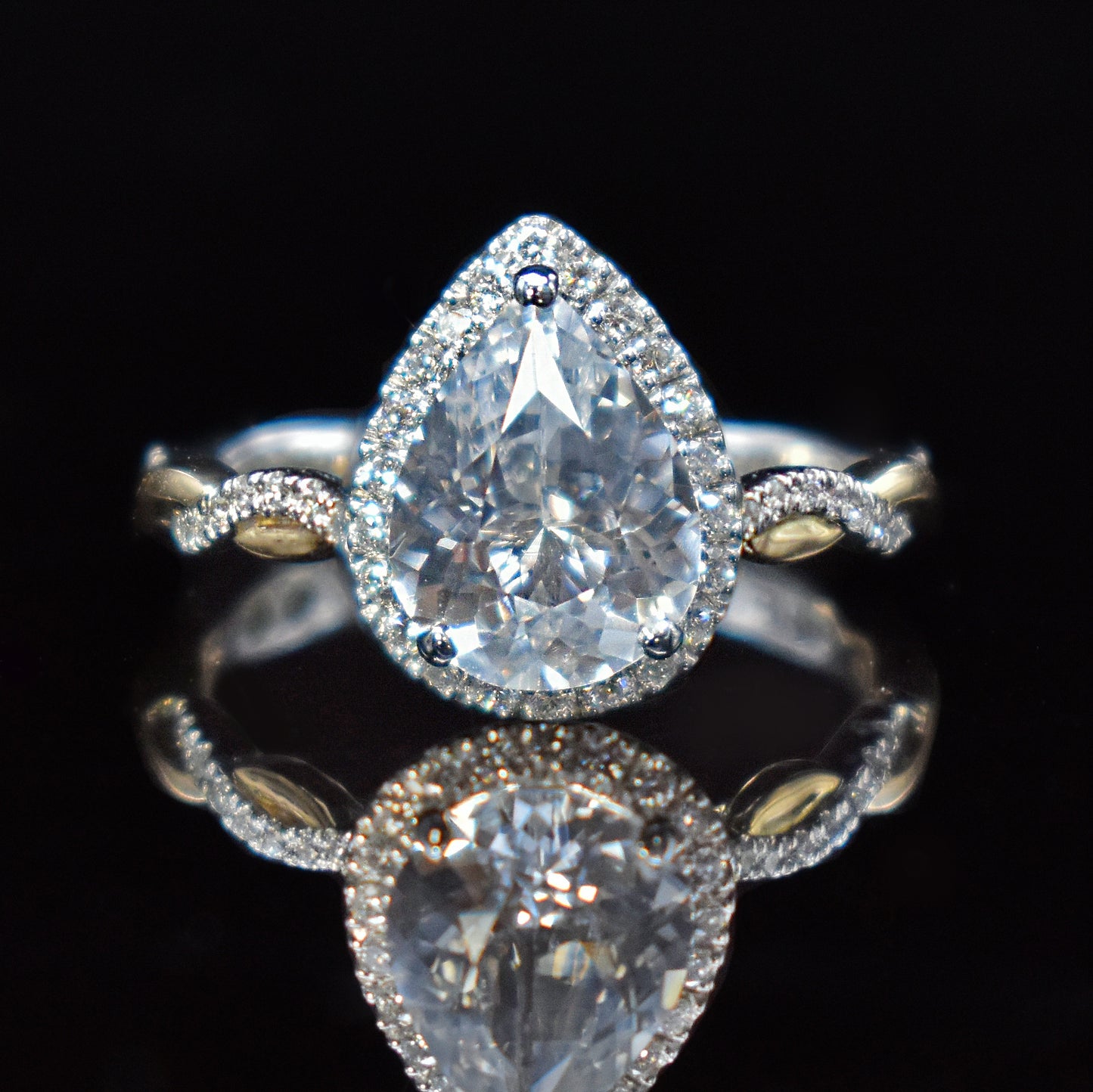 White sapphire halo engagement ring with 2 toned gold