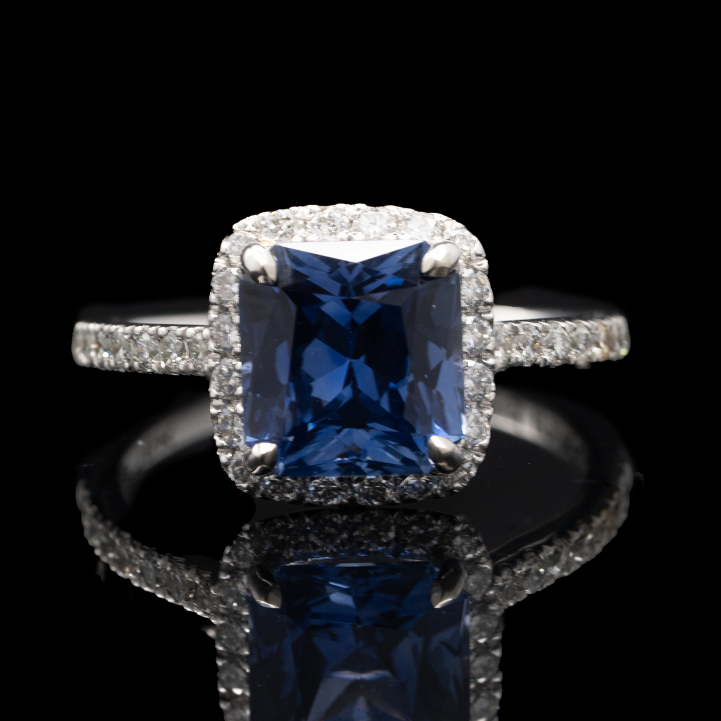 radiant cut sapphire ring with diamond halo