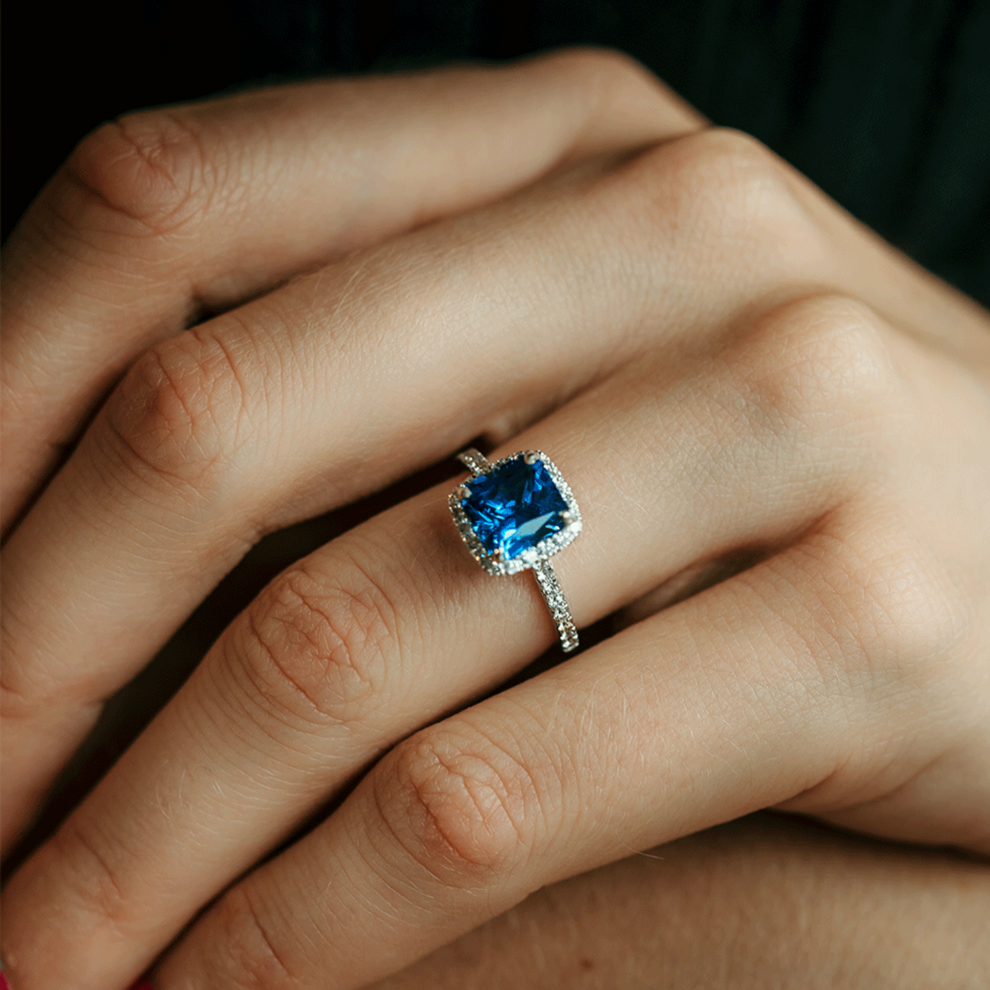 diamond halo engagement ring with sapphire