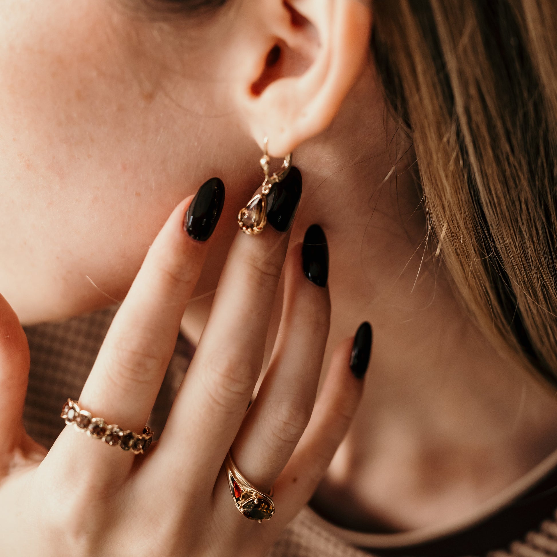 lifestyle of fall collections gold earings with andalusite and rings