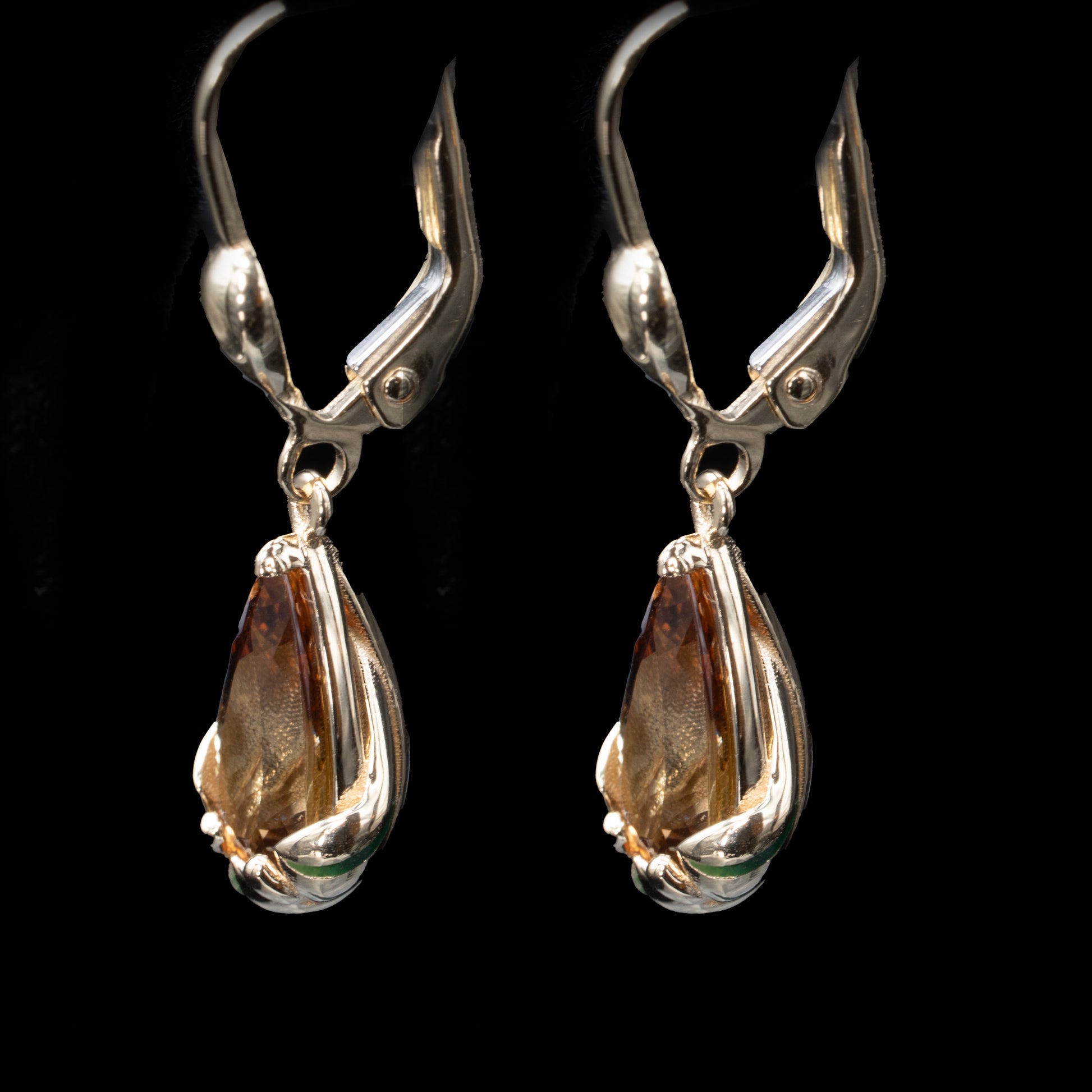side view of an andalusite petal earings