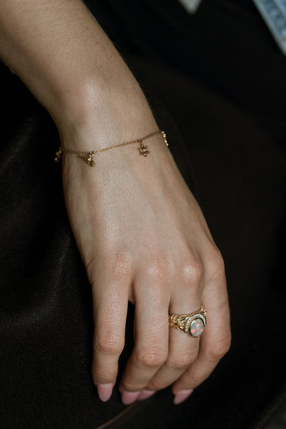 cowgirl charm bracelet with gold cactus