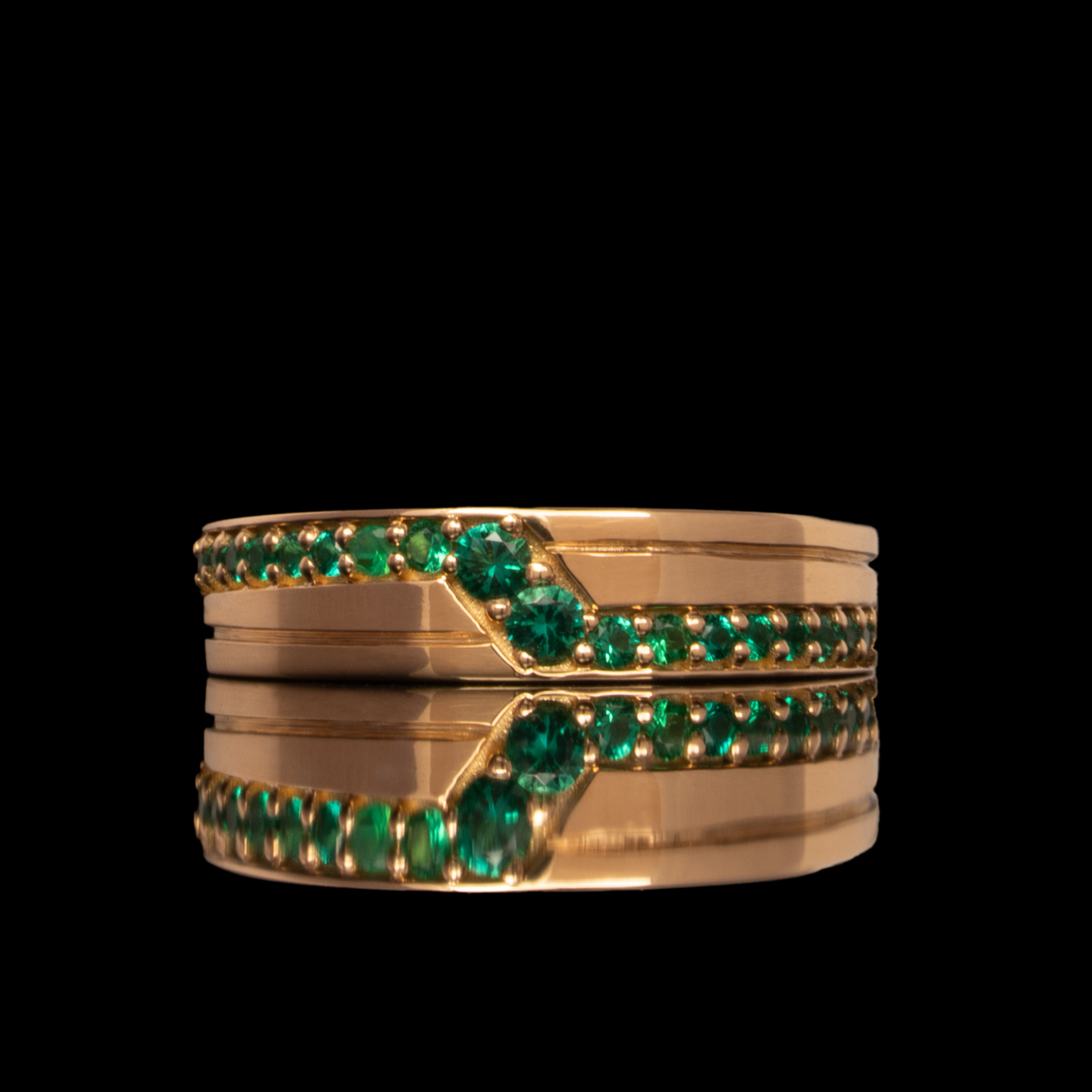 men's unique wedding band with emeralds