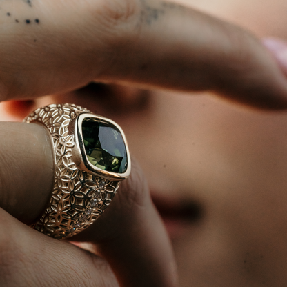 tourmaline ring with floral patterns and diamond pave