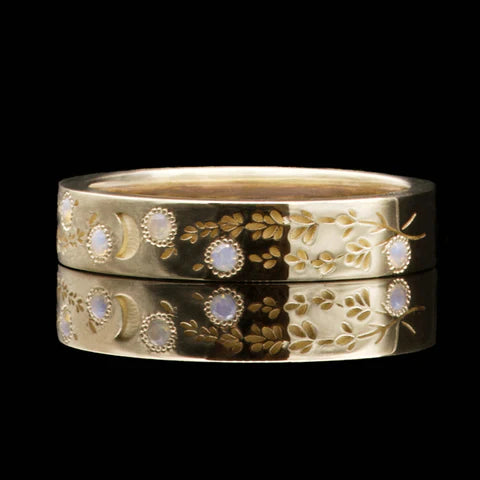 floral wedding band with ashes inside