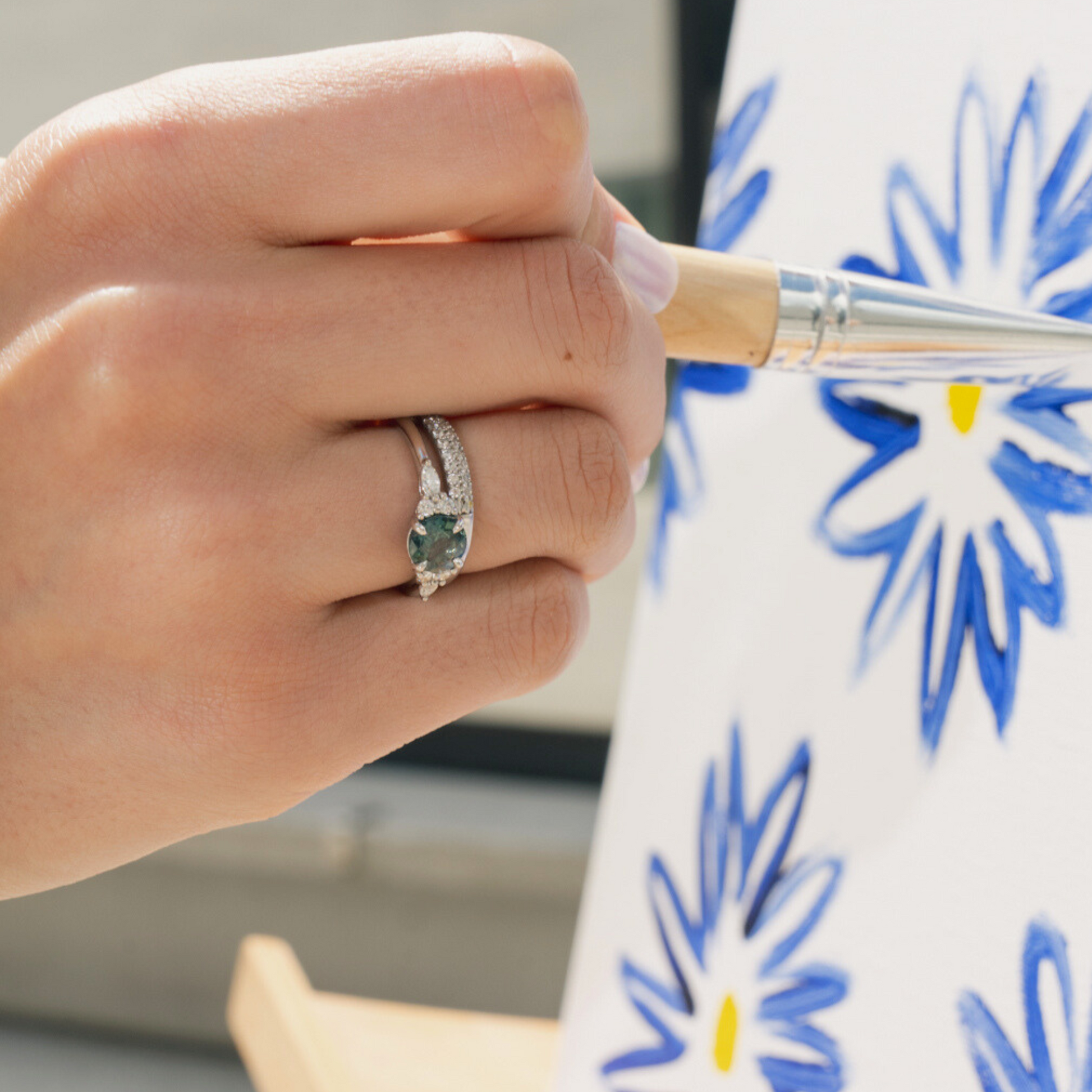 bespoke sapphire ring in platinum and diamond