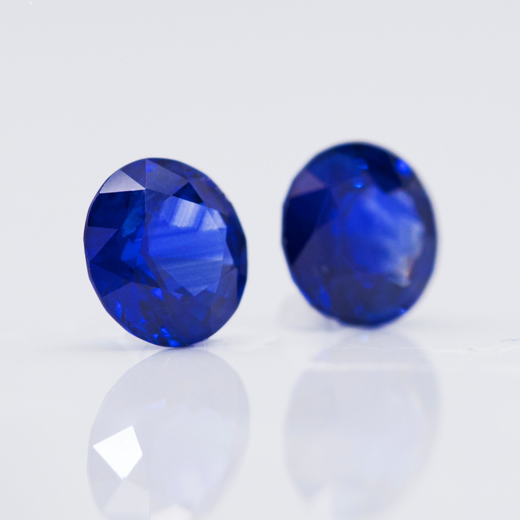 1.66ct round pair of royal blue sapphires. Natural stones for earrings.