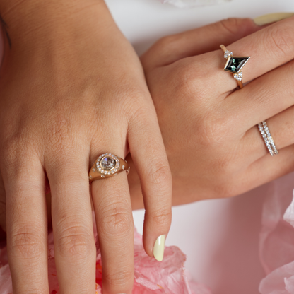 diamond signet ring with diamond stars along band
