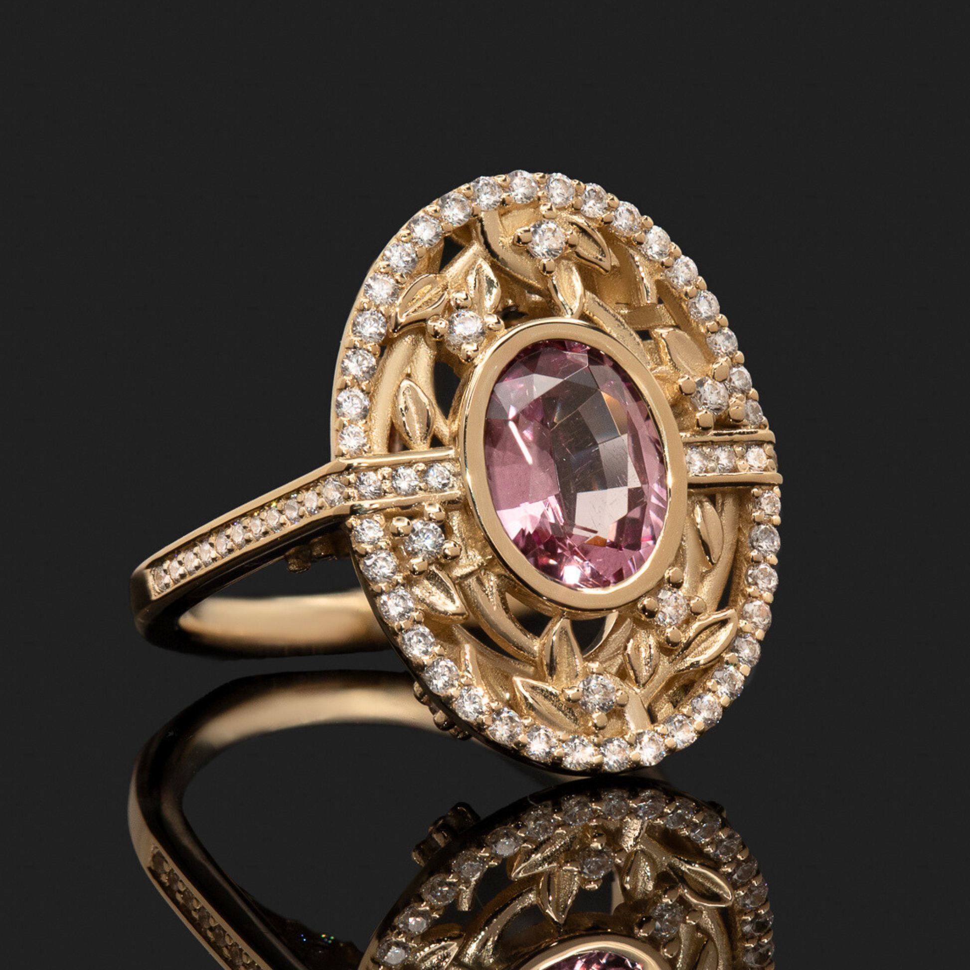Floral shield ring with pink sapphire engagement ring

