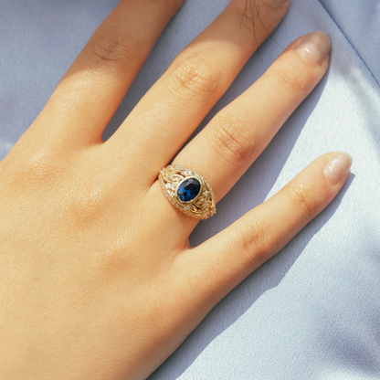 blue sapphire signet ring with diamond floral design 
