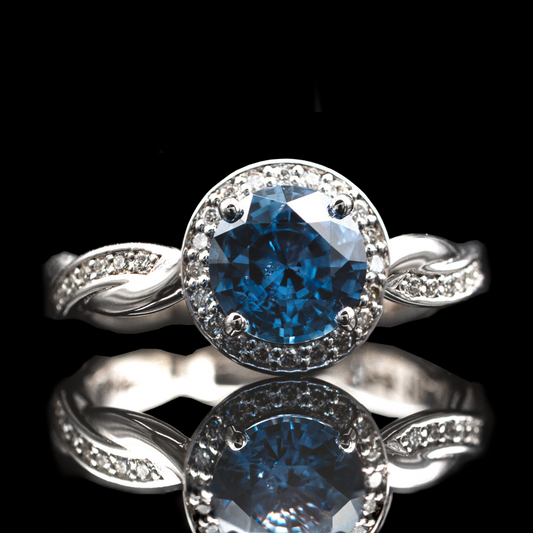 Blue sapphire engagement ring with twisted shank