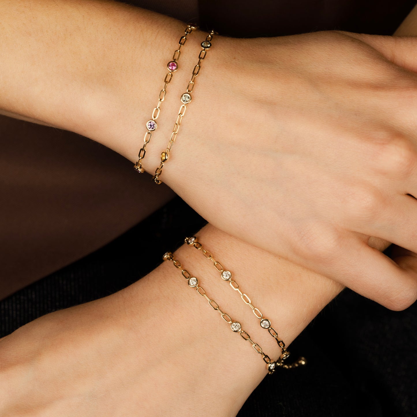 diamond and sapphire charm bracelets. Bezel set paperclip chain in 14K yellow