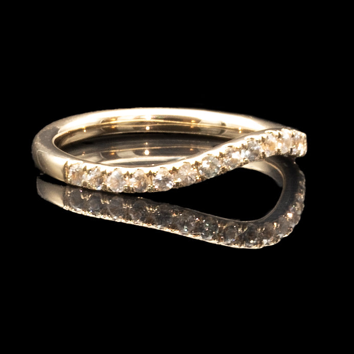 curved chevron wedding band with diamonds