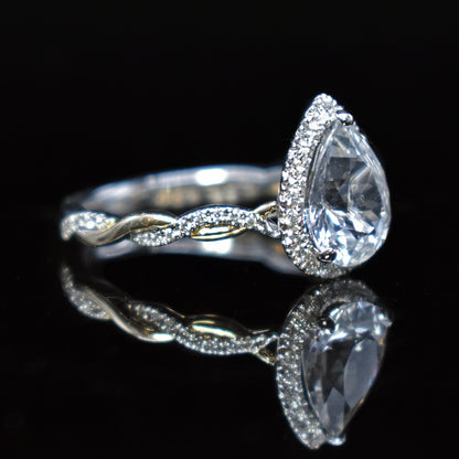 2 toned halo engagement rings pear cut