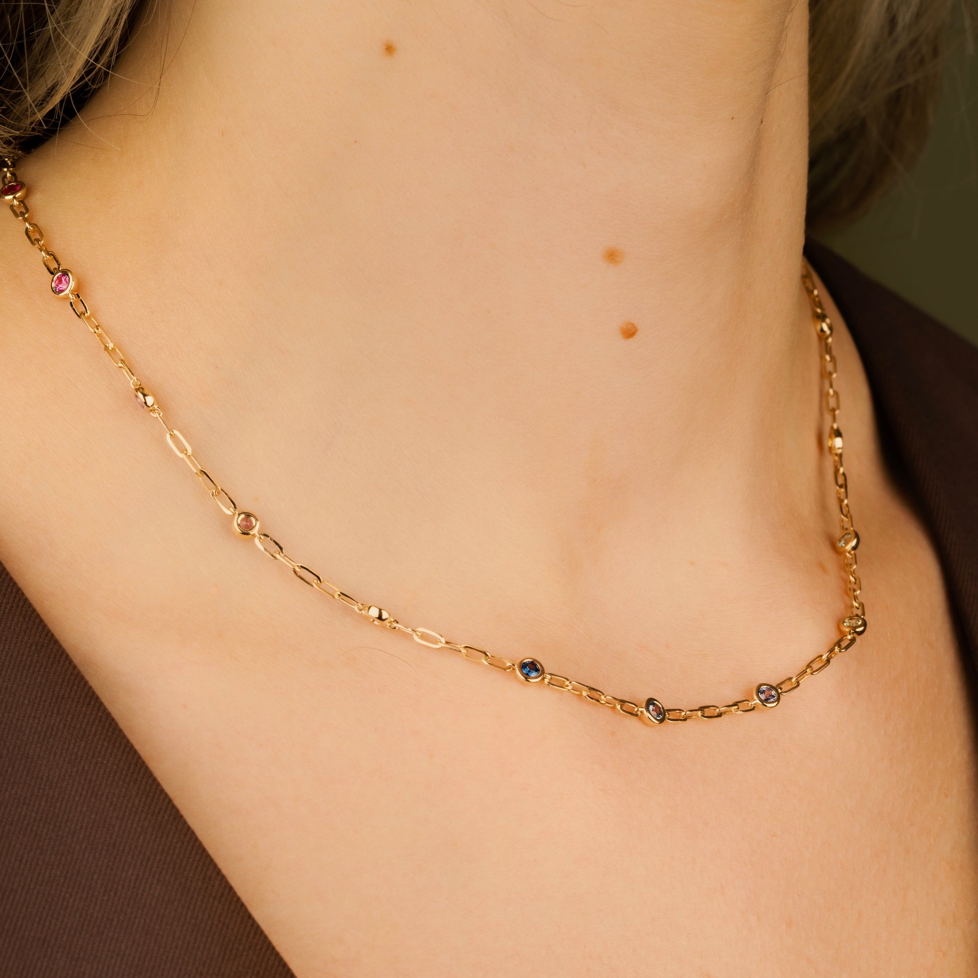 diamond bezel charm necklace. rainbow sapphire bezel necklace in 14kk yellow.