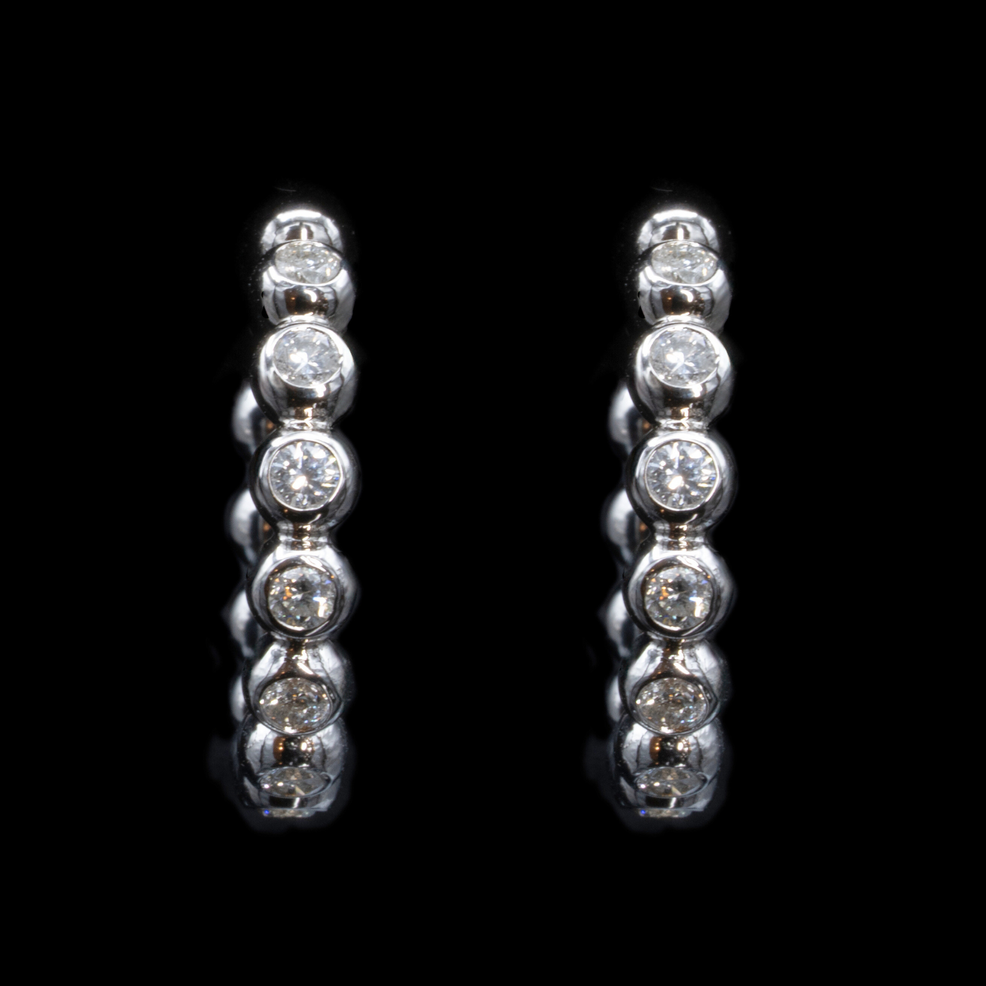 diamond hoop earrings in white goold