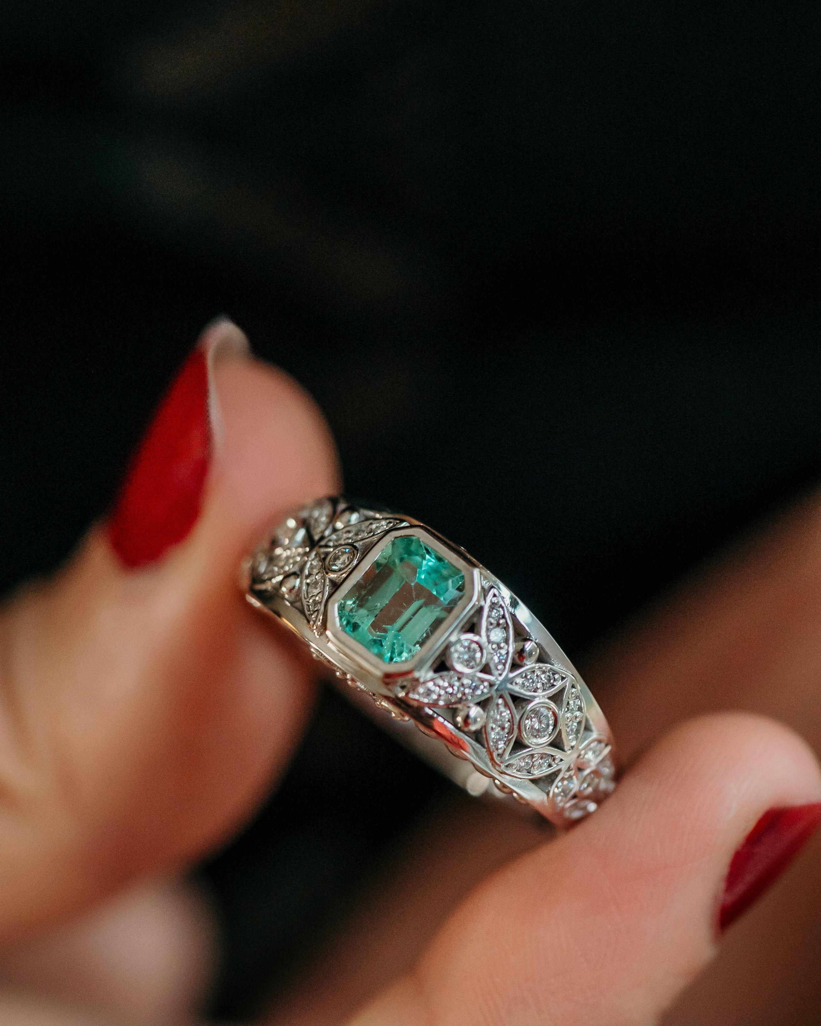 emerald and diamond wedding band floral design