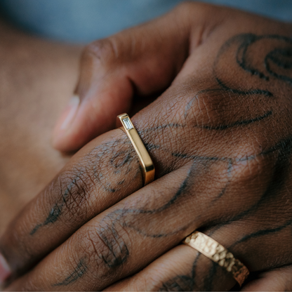 Square gold band with diamond baguette