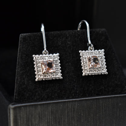 diamond earrings drop design with morganite cushions