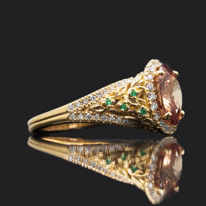oval padparadscha sapphire engagement ring with diamond halo
