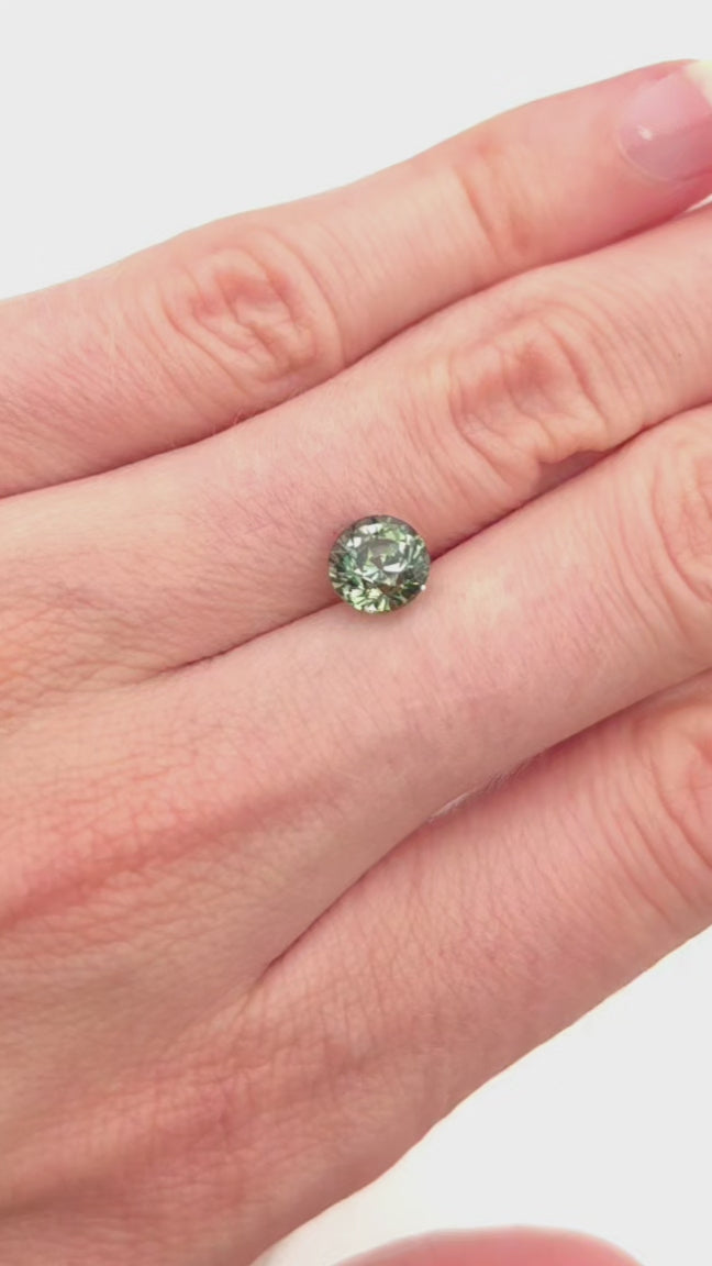 Natural green sapphire round stone over 2cts for sale