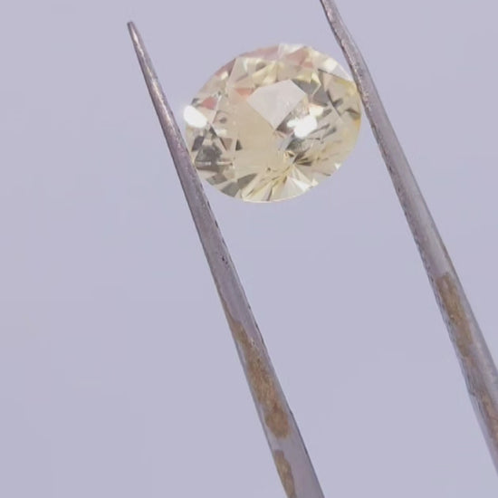 2.57ct oval cut bright yellow sapphire, loose gemstone