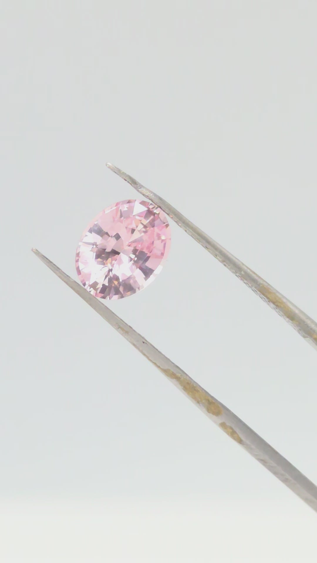 2.1ct peach colored sapphire, oval cut no heat