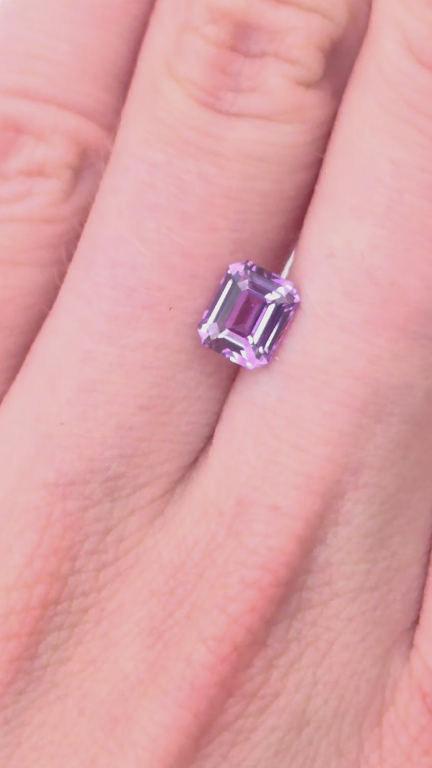 Purple emerald cut sapphire stone, no heat. 1.5cts