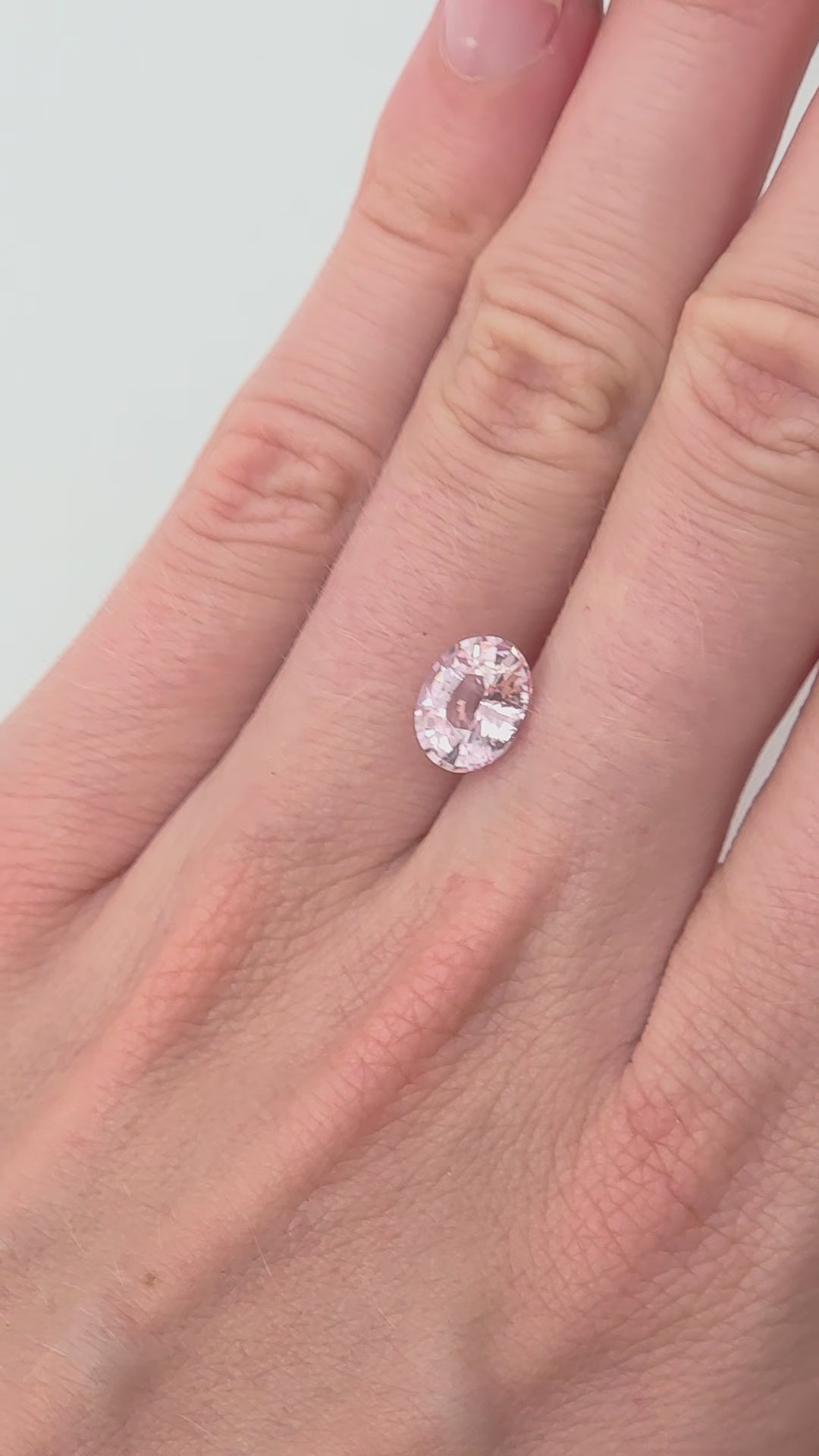 2.1ct natural no heat peach colored sapphire, oval shape for engagement ring