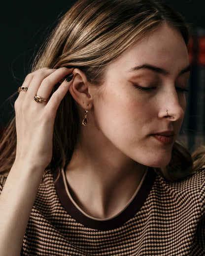 lifestyle of fall collections gold rings and earrings with andalusite gem