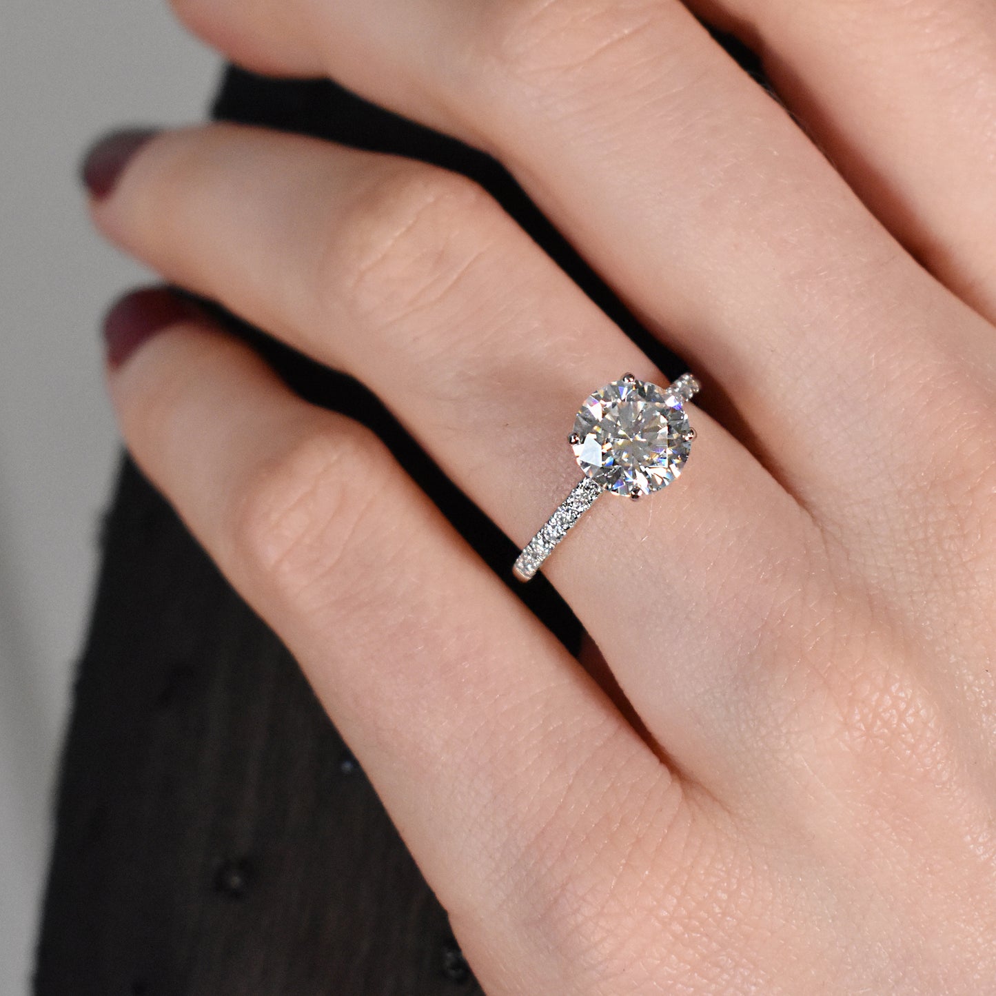 white sapphire diamond engagement ring with hidden halo
