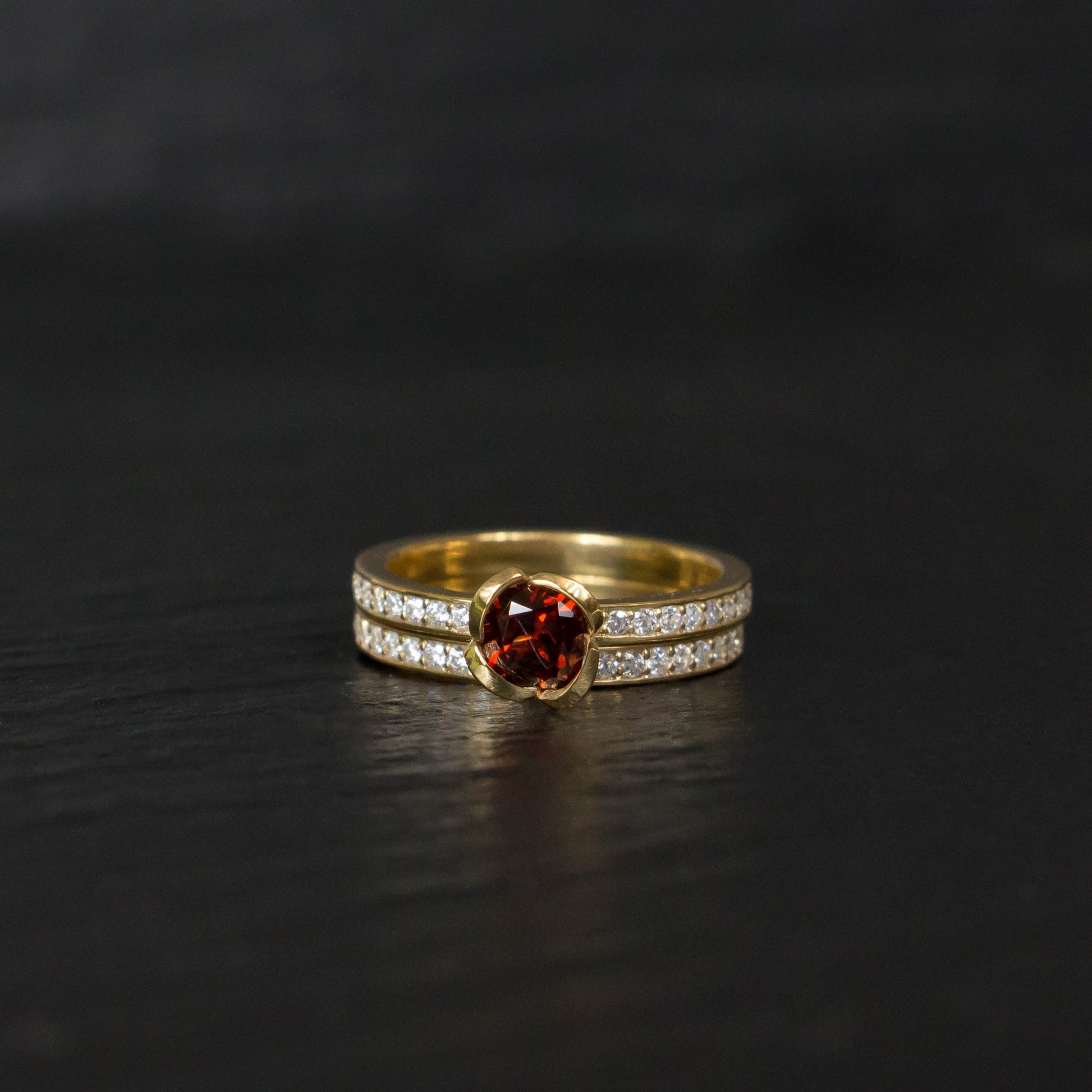 garnet engagement ring with diamond wedding band