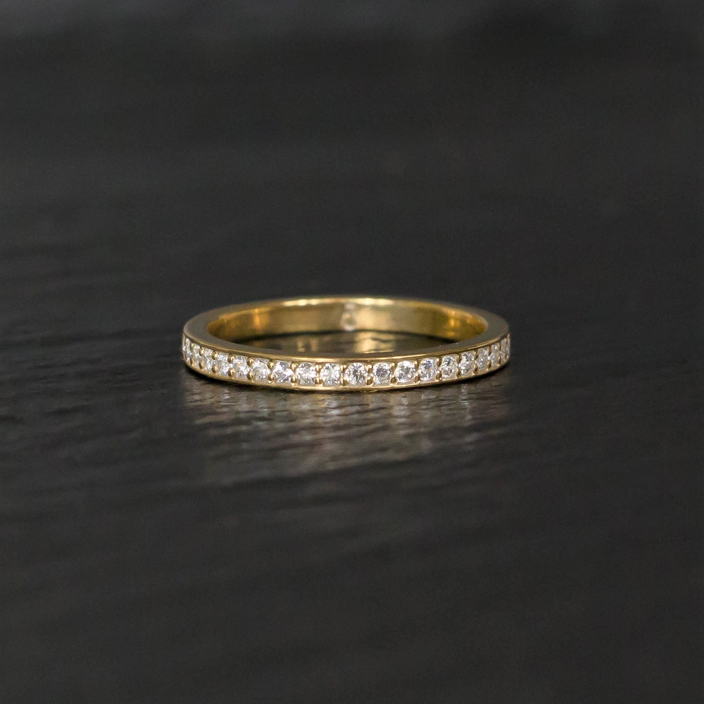 Bright cut wedding band in yellow gold and diamonds - stackable