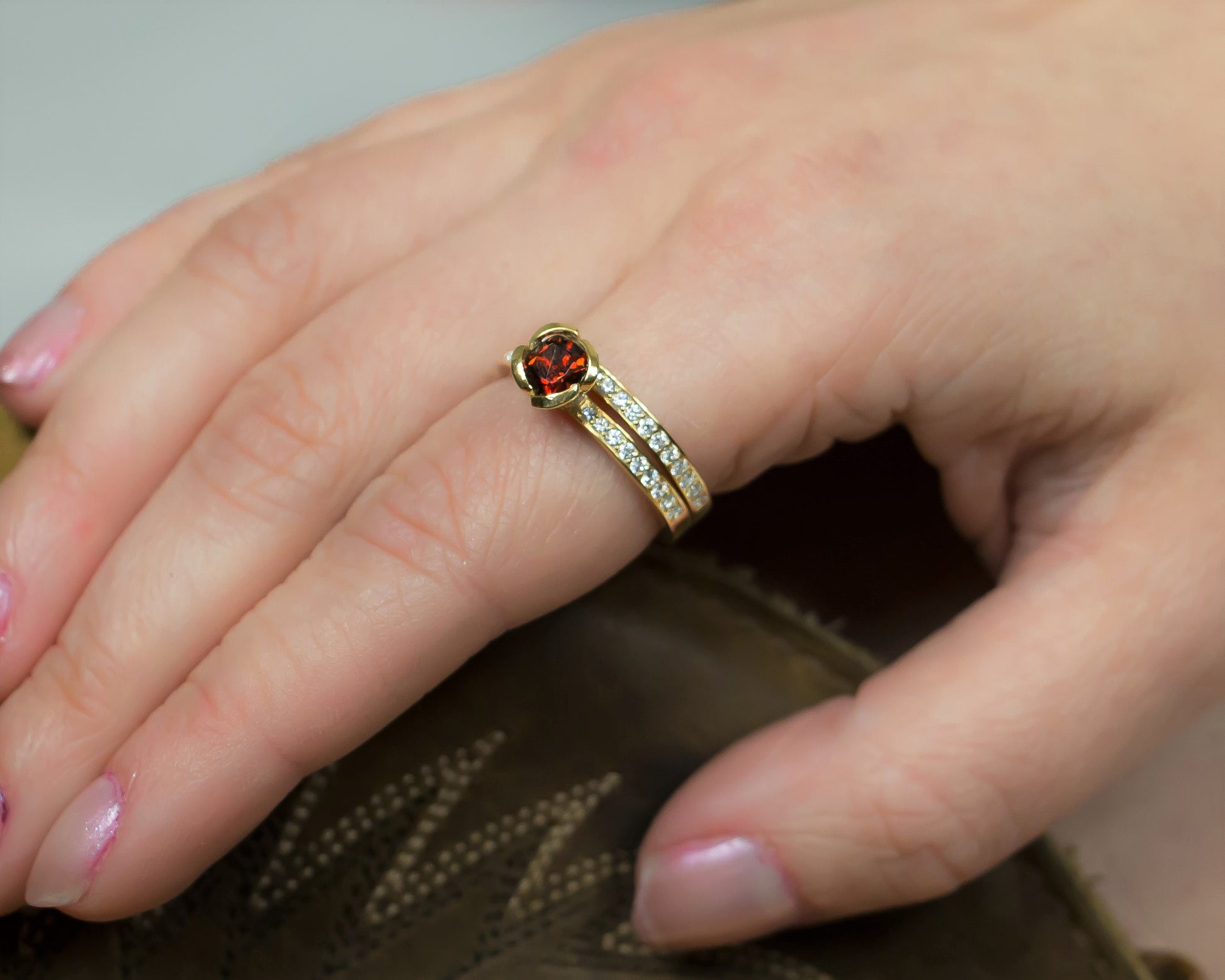 garnet engagement ring with diamond wedding band yellow gold