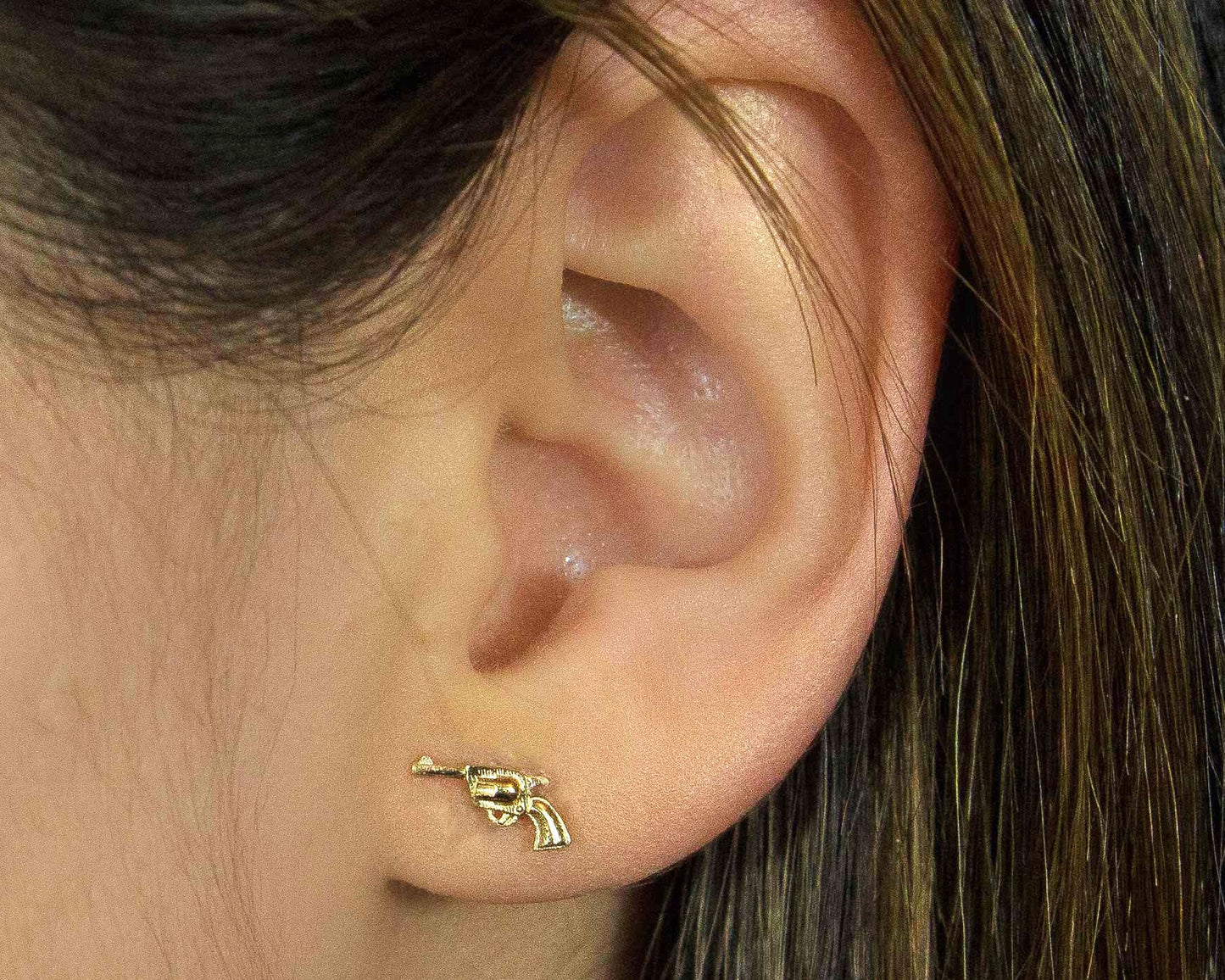 pistol earrings in gold cowgirl jewelry